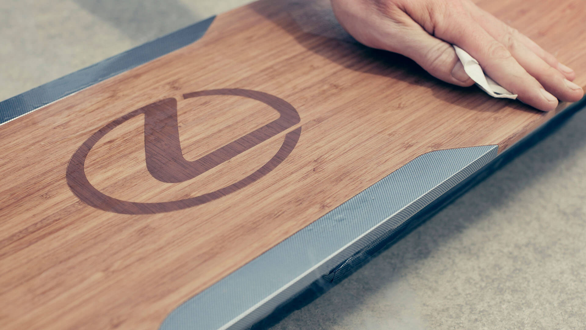 Someone cleaning a Lexus hoverboard